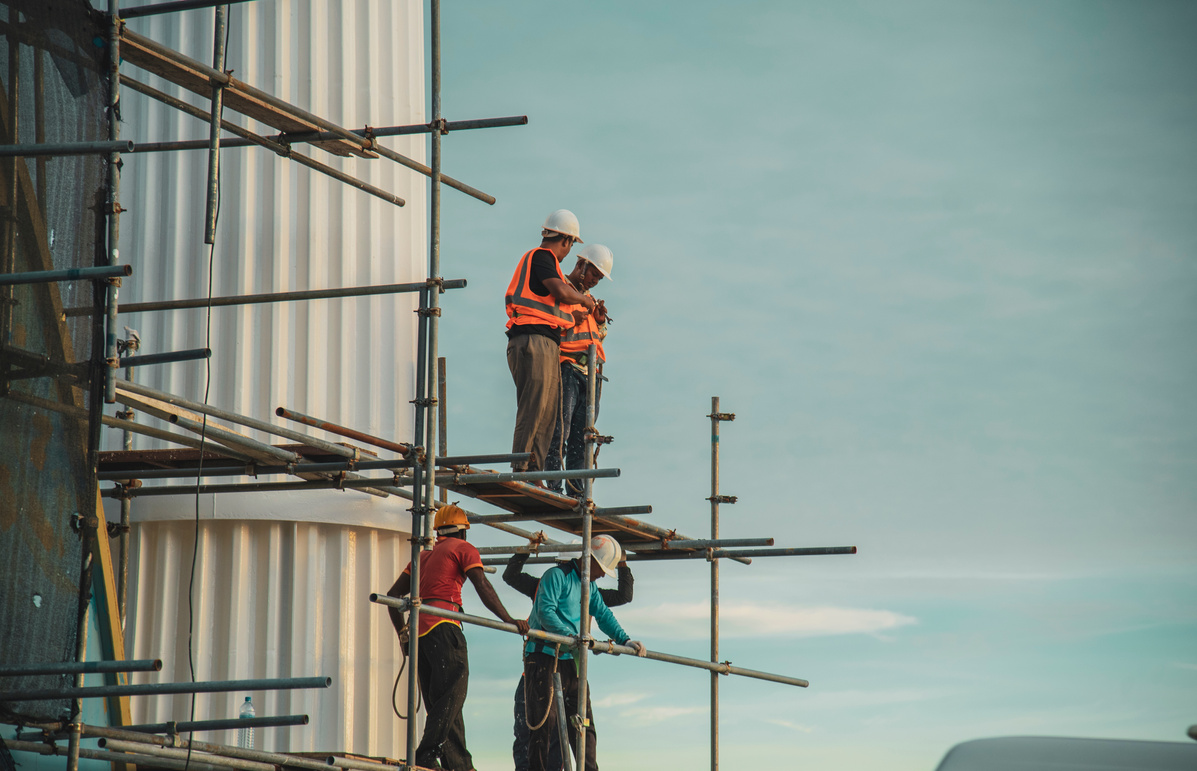 Construction Workers on a Scaffolding